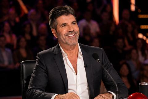Illustrative photograph for the story: Who Is Simon Cowell? The Man Who Changed Reality Talent Shows Forever